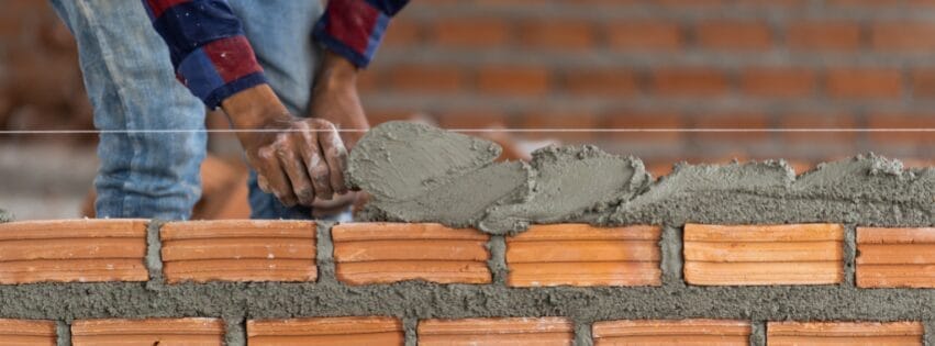 mason working on a wall