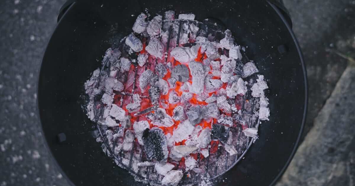 Igniting the charcoal.