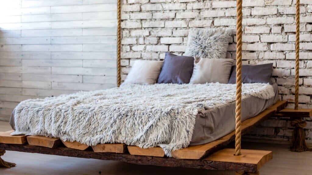Have you ever considered adding a hanging bed to your living room?