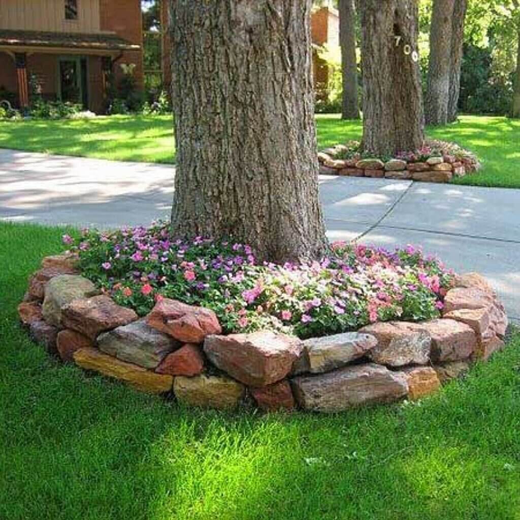 Creating mulch beds around trees can greatly benefit the health and appearance of your landscaping.