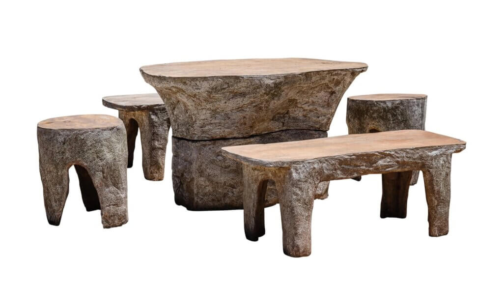 Outdoor dining areas featuring stone elements offer a timeless and natural aesthetic