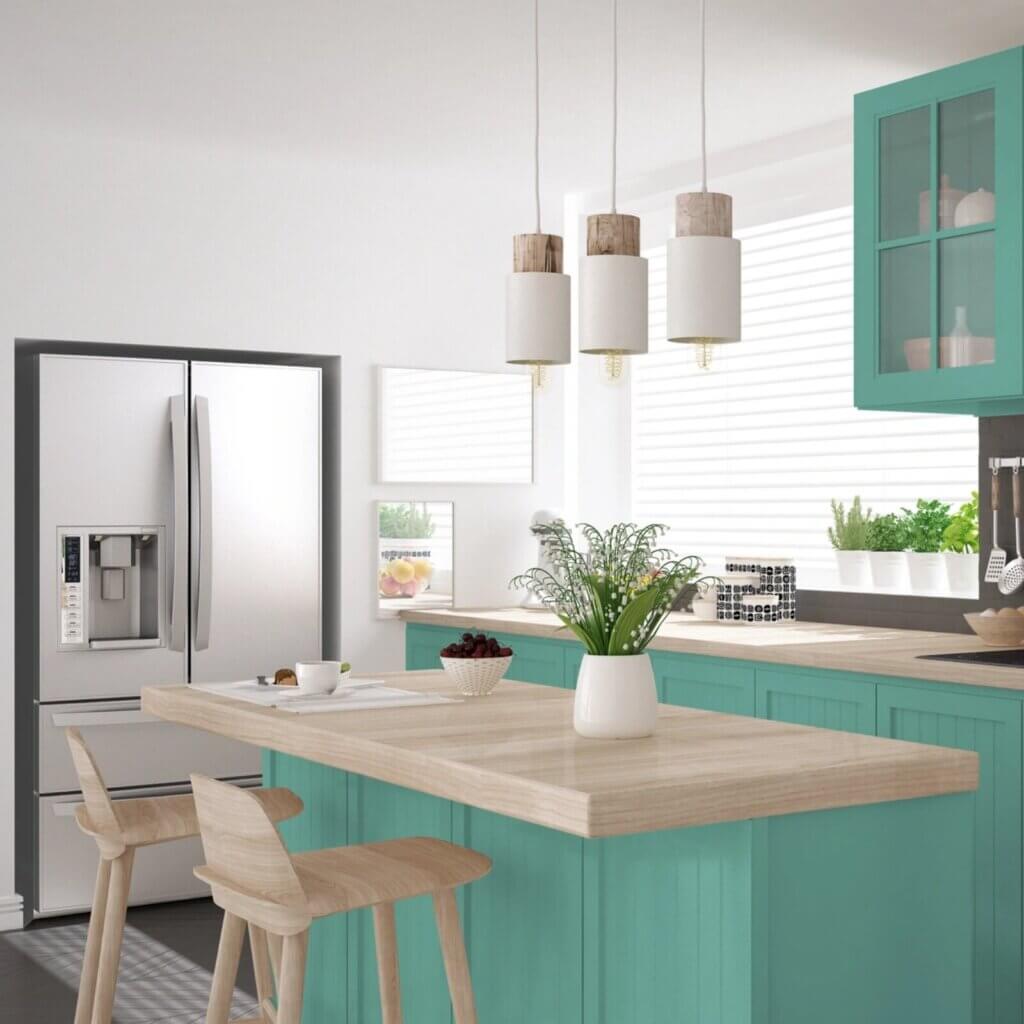 Consider experimenting with a dual-tone cabinet color scheme in your kitchen.