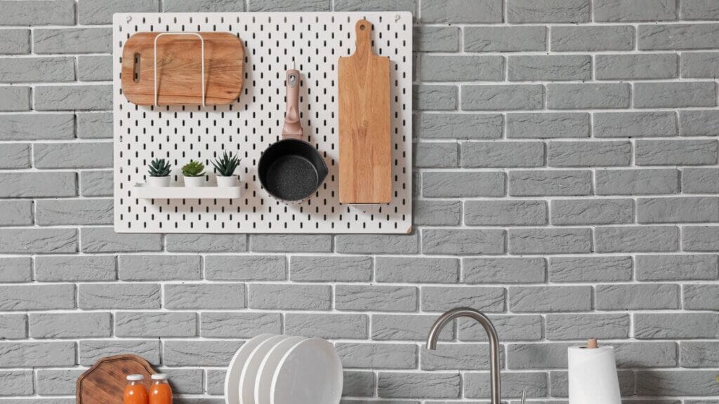 Use a pegboard for utensils in your kitchen organization ideas