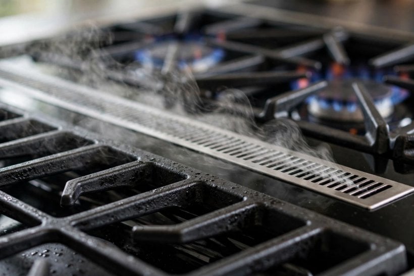down draft gas range: ducting route beneath an island cooktop
