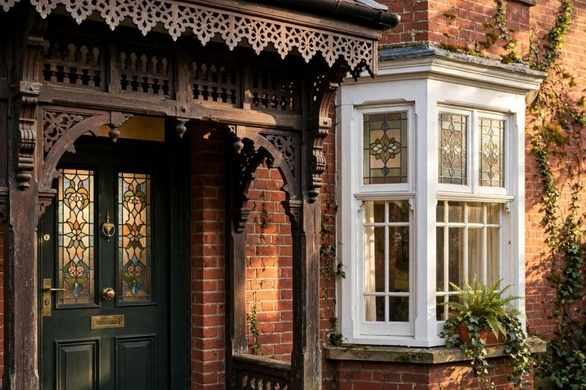edwardian architecture: tall bay window on a brick facade