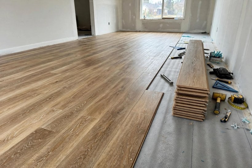 coretec flooring reviews 2018: click-lock planks joining along a hallway