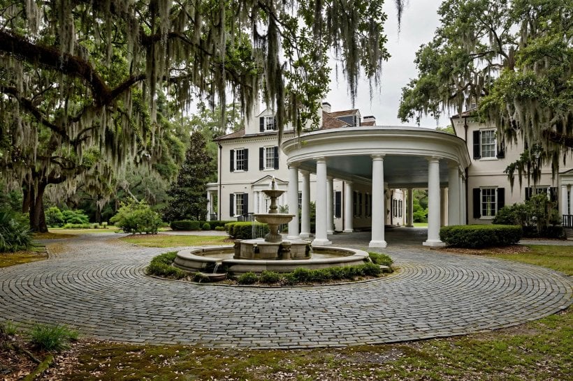 porte cochere: climbing roses around the posts