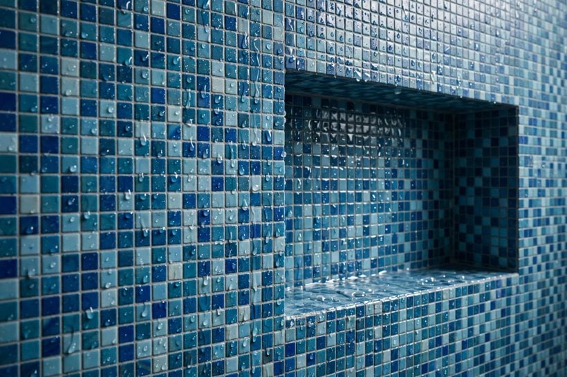 shower tile patterns: vertical stack tiles stretching a low ceiling