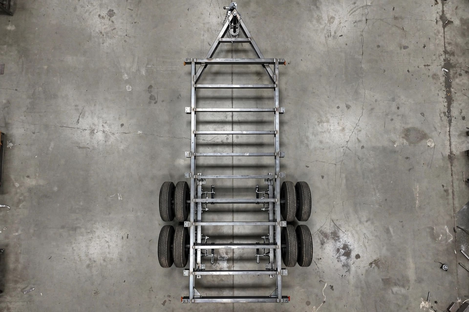 axle placement guide: top view of a bare trailer deck and axle group