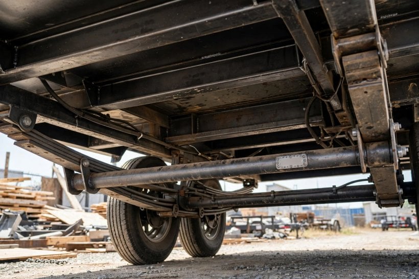 how to choose trailer axles for a tiny house: a tandem pair of rated axles carrying the trailer frame