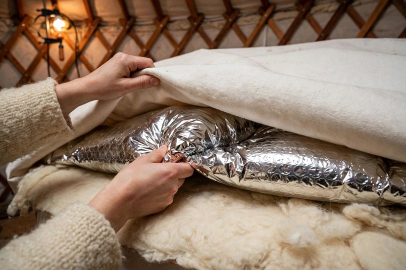 condensation control in yurts: a reflective insulation layer fitted between the felt and the outer canvas