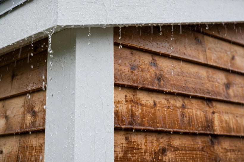Exterior Trim Materials: corner boards and fascia shedding rain on a tiny house