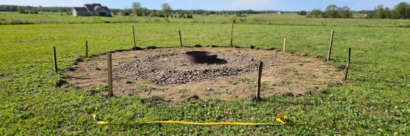 Fire Pit Seating: a fire ring sited on mineral soil with clearances measured out