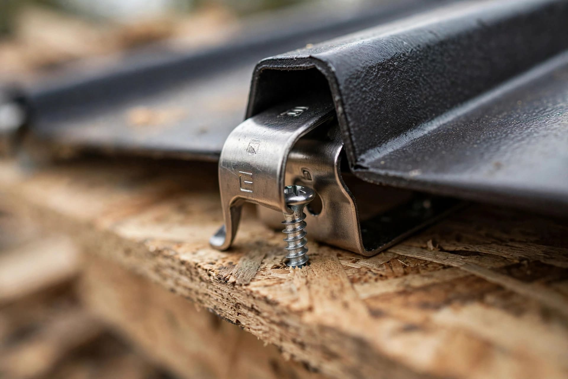 metal siding oil canning: concealed clip fastening detail that lets panels move