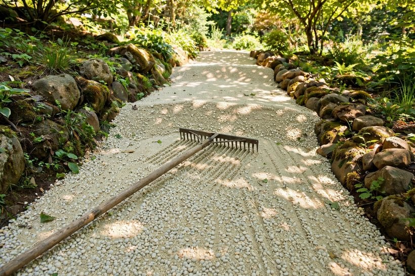 Gravel Path with Rock Borders: pea gravel raked level with a slight crown between the borders