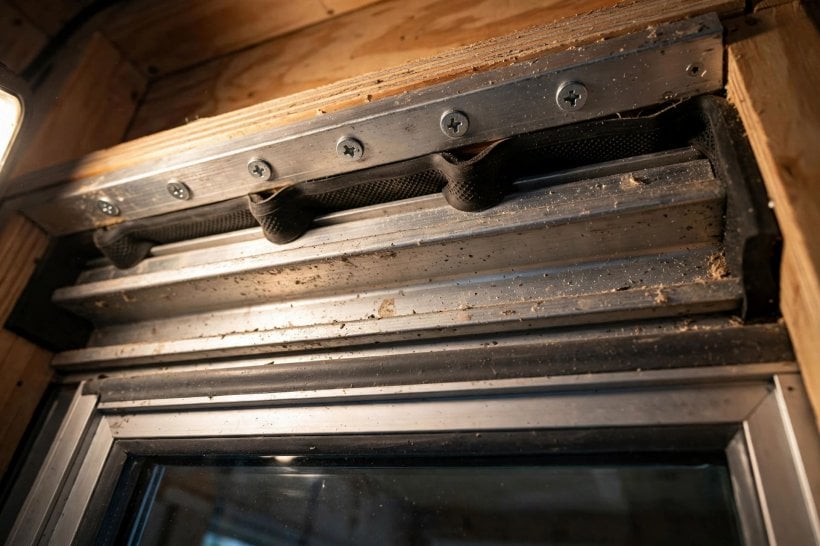 sliding glass doors: pan-head screws and shims stopping vertical lift