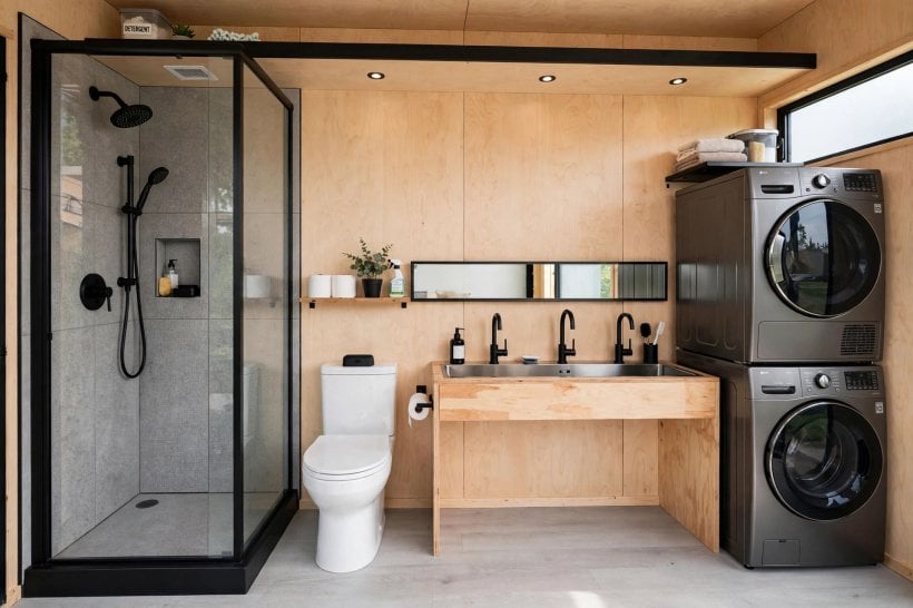 Tiny House Bathroom Layouts: shower, toilet and stacked laundry sharing one plumbing wall
