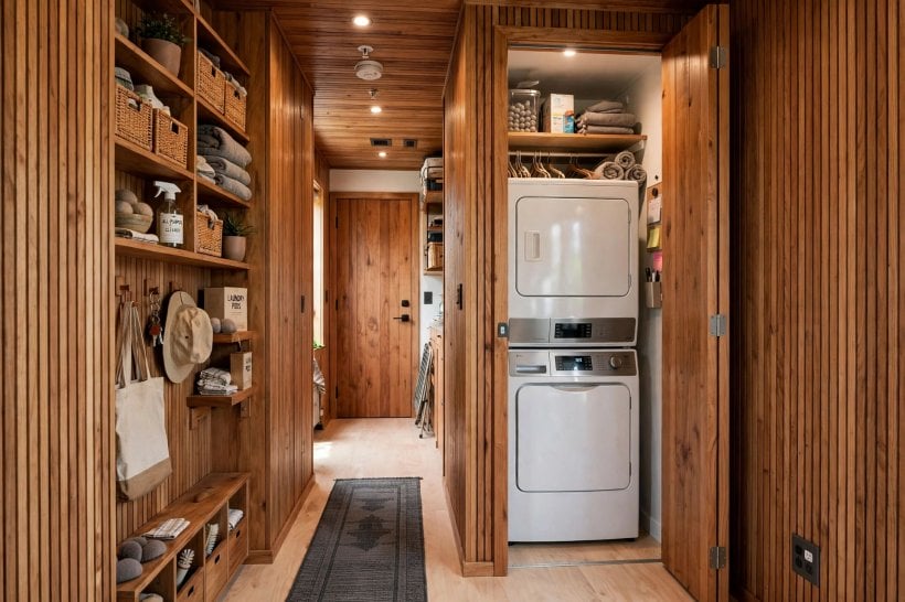 Tiny House Bathroom Layouts: a stacked washer-dryer in a bifold-door hallway closet