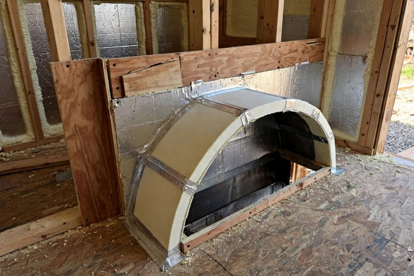 wheel well header calculator: insulated and flashed well box inside the wall